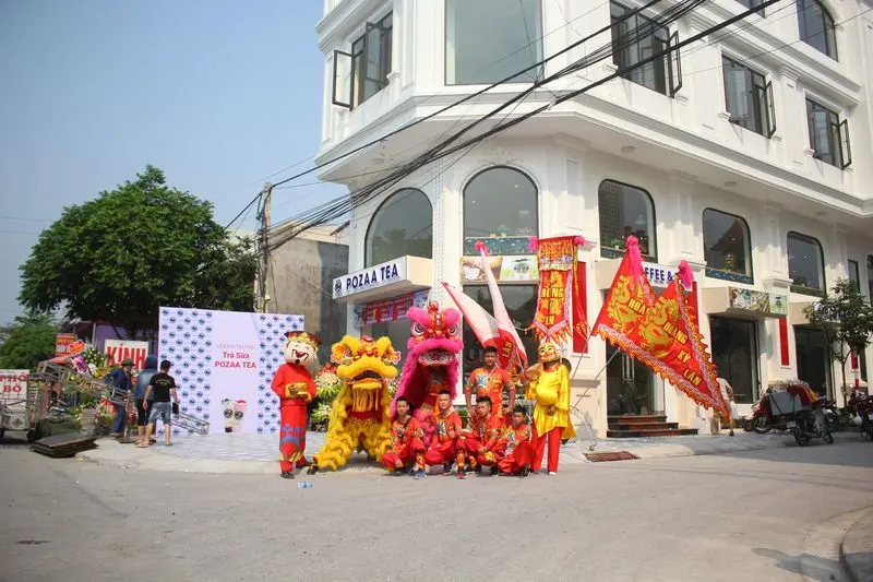 Hình ảnh quán trà sữa Pozaa Tea tổ chức sự kiện múa lân